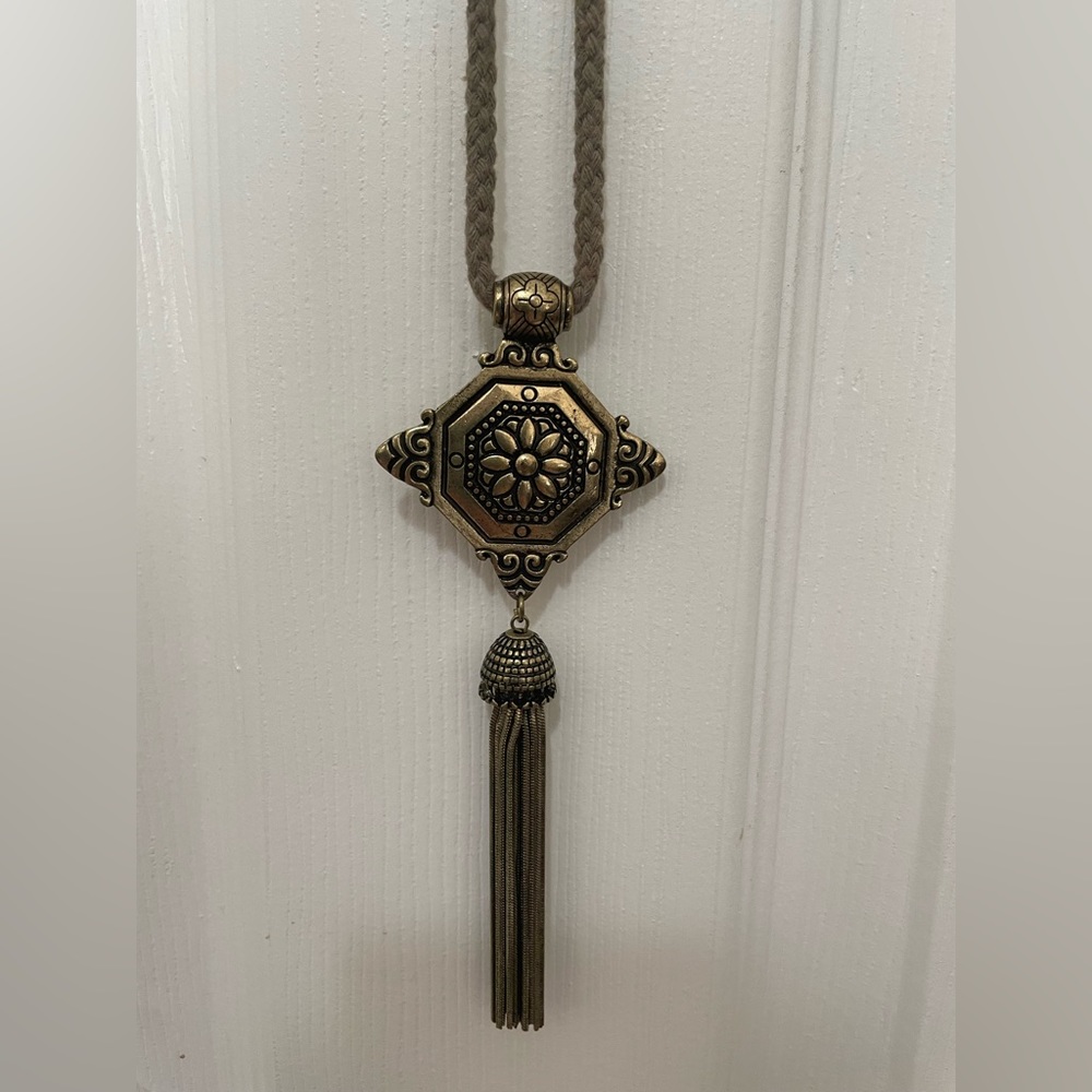 Free people Brass pendant on olive green rope